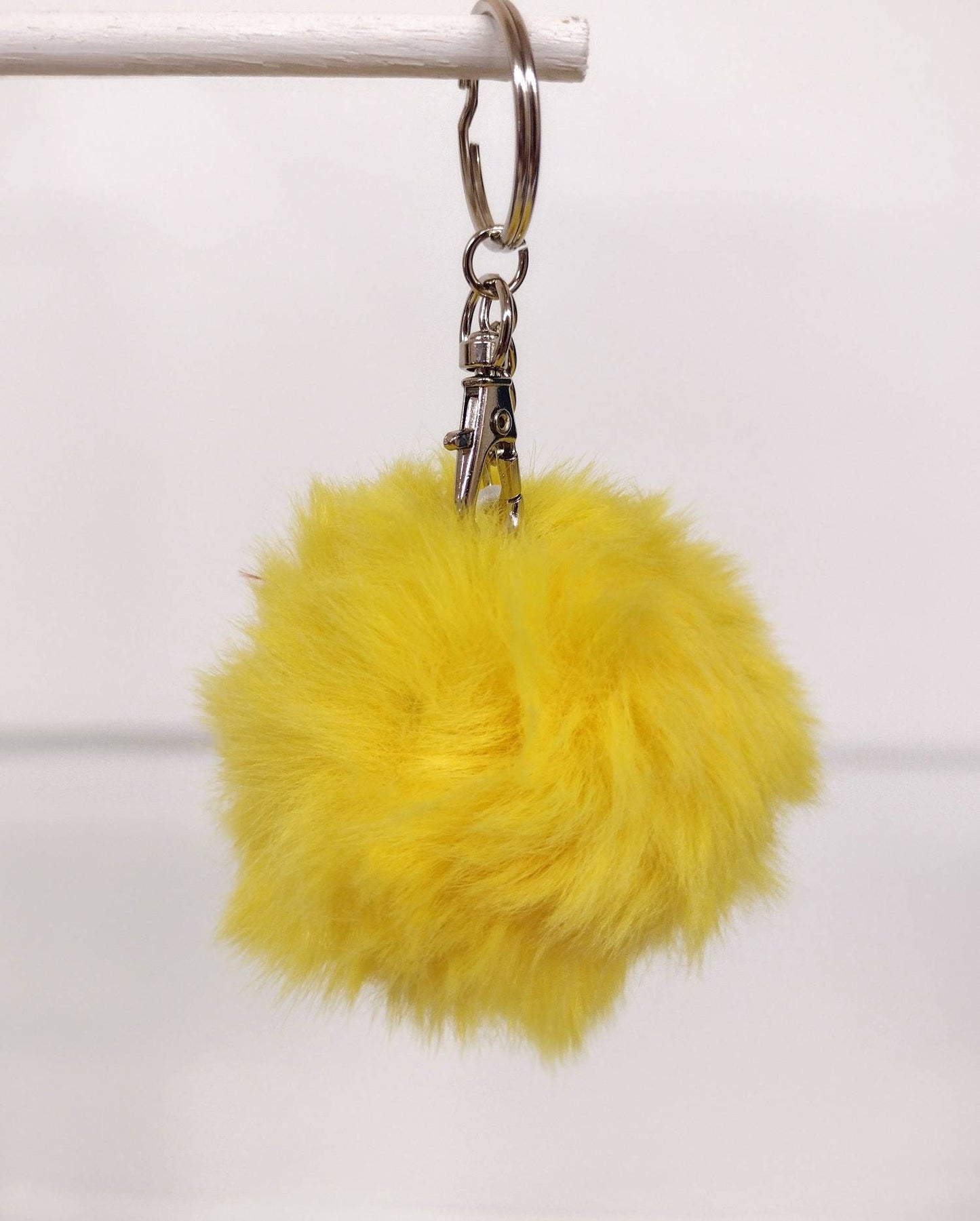 Yellow faux fur pom pom keychain with lobster clasp
